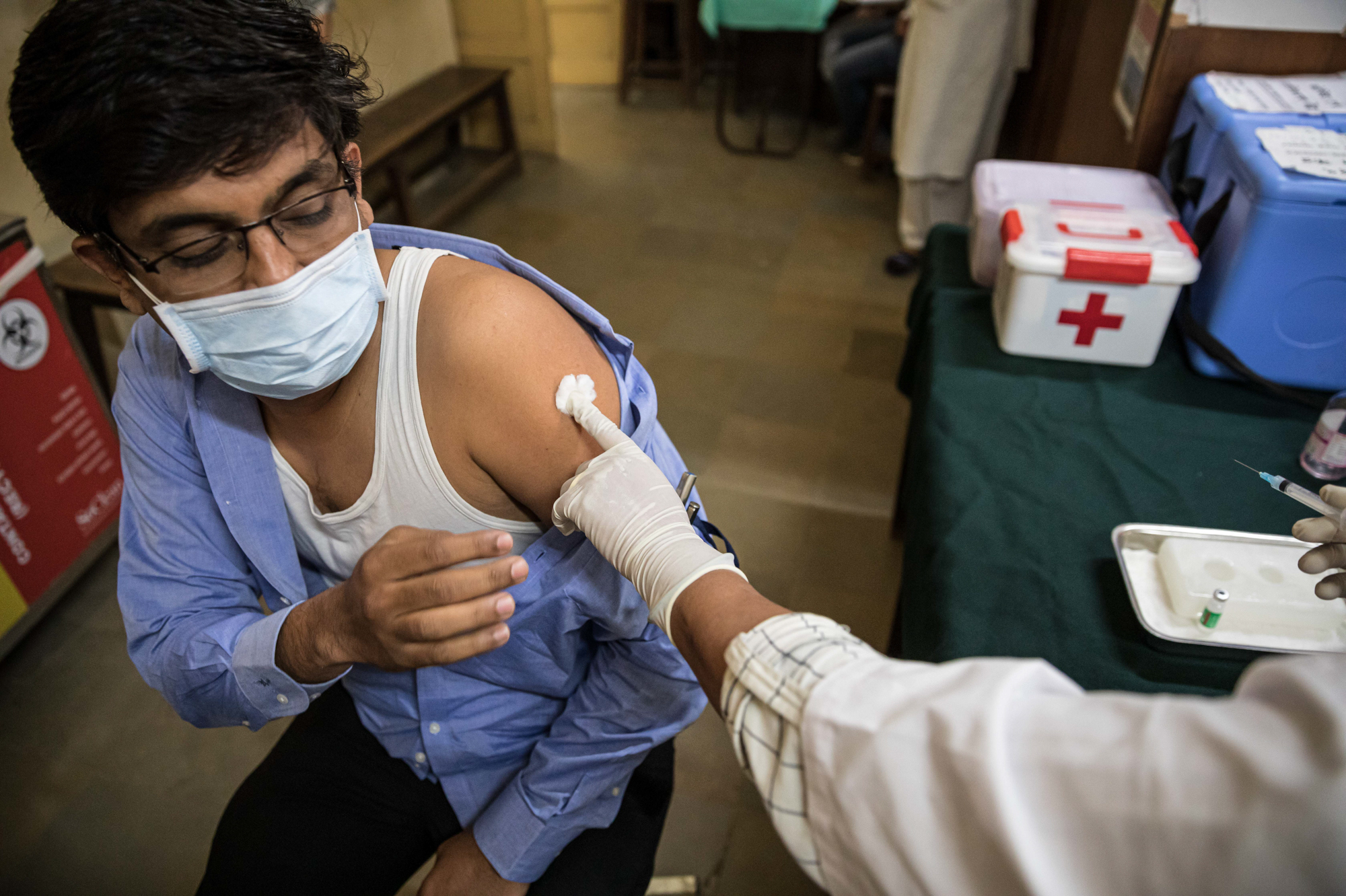 india-man-vaccine-injected-syringe.jpg